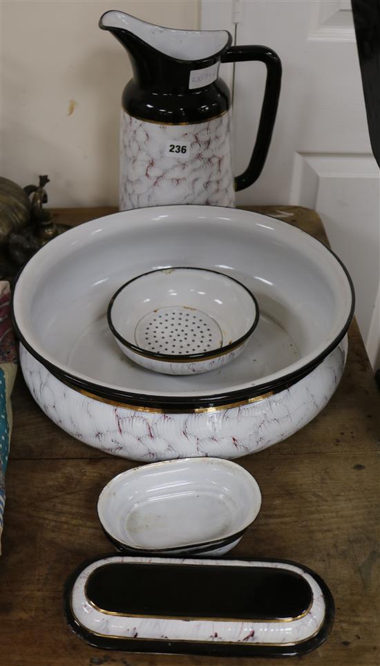 A tin and enamel wash bowl, jug, etc.